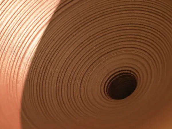 Close-up of a reel of brown kraft paper